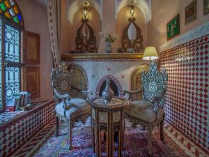 Posezení v ubytování Riad & Spa Laurence Olivier