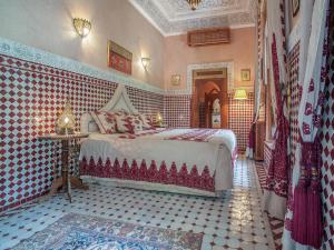 Postel nebo postele na pokoji v ubytování Riad & Spa Laurence Olivier