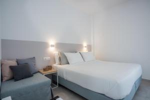 Postel nebo postele na pokoji v ubytování Nautilus Apartments-Suites
