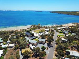 an aerial view of a resort next to the ocean at Longbeach Apartments in Coffin Bay