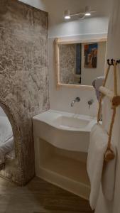 Kúpeľňa v ubytovaní Grey Rooms Naxos