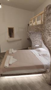 Posteľ alebo postele v izbe v ubytovaní Grey Rooms Naxos