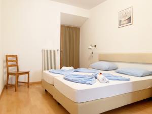 Posteľ alebo postele v izbe v ubytovaní Argentieri Guesthouse