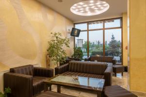 אזור ישיבה ב-Adamo Hotel