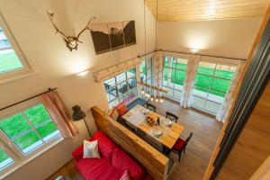 an overhead view of a dining room and kitchen in a tiny house at Chalet 164 in Bad Goisern