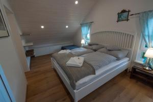 Łóżko lub łóżka w pokoju w obiekcie Chalet 164