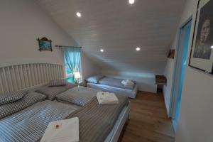 Łóżko lub łóżka w pokoju w obiekcie Chalet 164