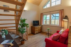 Telewizja i/lub zestaw kina domowego w obiekcie Chalet 164