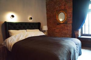 Posteľ alebo postele v izbe v ubytovaní Apartamenty Centrum RS SUITES Kowalska 12