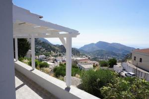 a view from the balcony of a house at Volada Your View in Apérion
