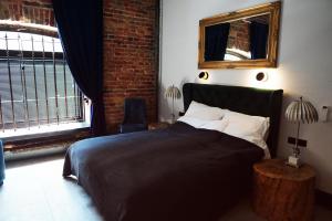 Posteľ alebo postele v izbe v ubytovaní Apartamenty Centrum RS SUITES Kowalska 12