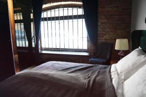 Posteľ alebo postele v izbe v ubytovaní Apartamenty Centrum RS SUITES Kowalska 12