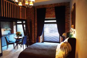 Posteľ alebo postele v izbe v ubytovaní Apartamenty Centrum RS SUITES Kowalska 12