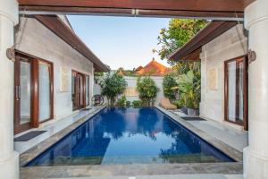an image of a swimming pool in a house at Taman Kesari Villas in Sanur
