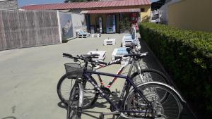 a couple of bikes parked next to a building at Osman Aga in Palermo