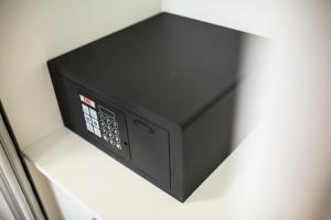 a black box sitting on top of a shelf at IG Nachosol Atlantic & Yaizasol by Servatur - Adults Only in Puerto Rico de Gran Canaria