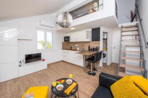 Kuchyň nebo kuchyňský kout v ubytování Apartment Velvet