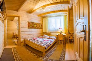 
Łóżko lub łóżka w pokoju w obiekcie Stare Krzeptówki
