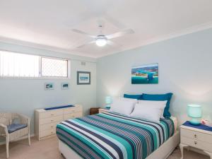A bed or beds in a room at Fairholme 8, Perfect Lakefront Position