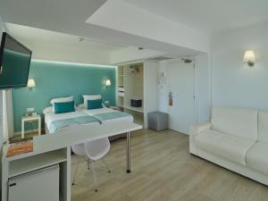 Postel nebo postele na pokoji v ubytování BQ Apolo Hotel