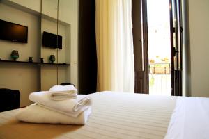 Posteľ alebo postele v izbe v ubytovaní Bed & Breakfast Duomo Di Taormina