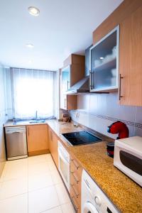 Kuchnia lub aneks kuchenny w obiekcie Apartamentos Be Suites Primera Linea