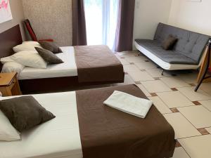 Postel nebo postele na pokoji v ubytování Hôtel restaurant Mon Auberge