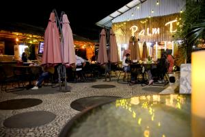 Restoran või mõni muu söögikoht majutusasutuses Batuque Town Villa