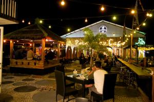 Restoran või mõni muu söögikoht majutusasutuses Batuque Town Villa