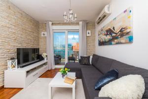 TV a/nebo společenská místnost v ubytování Apartment Kristina