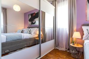 Postel nebo postele na pokoji v ubytování Apartment Kristina