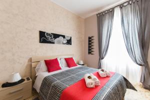 Postel nebo postele na pokoji v ubytování Vecchio Treno guest house