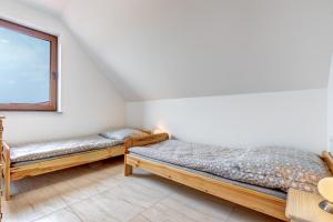 Łóżko lub łóżka w pokoju w obiekcie Amber House