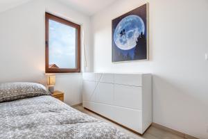 Łóżko lub łóżka w pokoju w obiekcie Amber House