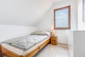 Łóżko lub łóżka w pokoju w obiekcie Amber House