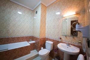 Koupelna v ubytování Amani Hotel Suites & Spa
