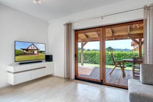 Telewizja i/lub zestaw kina domowego w obiekcie Amber House