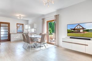Telewizja i/lub zestaw kina domowego w obiekcie Amber House