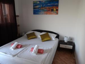 Postel nebo postele na pokoji v ubytování Villa Brasina