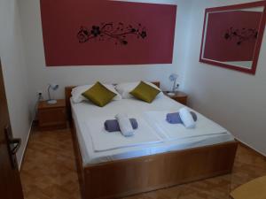 Postel nebo postele na pokoji v ubytování Villa Brasina