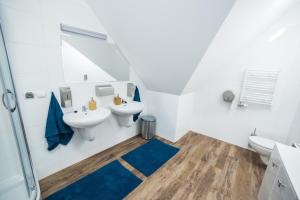 Koupelna v ubytování Apartament Miejski + 8 fotografií
