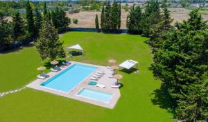 an overhead view of a large yard with a swimming pool at Tenuta Don Carmelo in Lecce