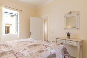 Postel nebo postele na pokoji v ubytování MarGreCo in Garitsa + 10 fotografií