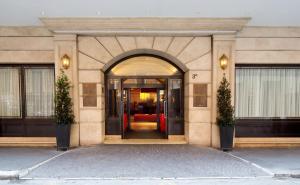 an entrance to a building with an open door at Starhotels Metropole in Rome
