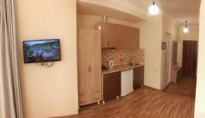 Kuchyň nebo kuchyňský kout v ubytování Hotel Tao