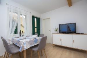 TV a/nebo společenská místnost v ubytování Apartment Rita