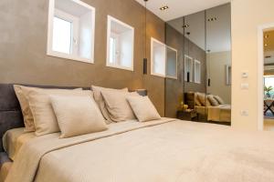 Ein Bett oder Betten in einem Zimmer der Unterkunft Apartmani Paklenica Noa