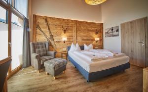 Postel nebo postele na pokoji v ubytování AlpenParks Hotel & Apartment Sonnleiten + 37 fotografií