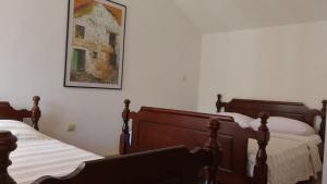 Postel nebo postele na pokoji v ubytování Agrotourism Matusko