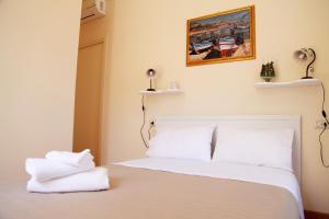 Posteľ alebo postele v izbe v ubytovaní Bed & Breakfast Duomo Di Taormina